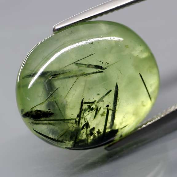 Collectors 26.96ct heavily rutilated Prehnite
