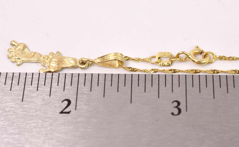 Distinct Foot Print Pendant Necklace in 14K Yellow Gold