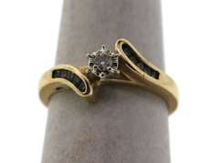 Lone Diamond Ring with encrusted Channel Set Diamonds inside 14k Gold Band