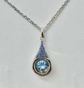 Platinum over 925 non tarnish Sterling silver with large fancy blue pendant