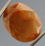 UNTREATED! Shimmering 11.46ct red toned faceted Sapphire
