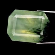 Massive 64.45ct rutilated Prehnite