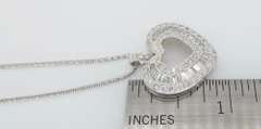 Elegant Diamond Heart Necklace with Baguette and Round Diamonds