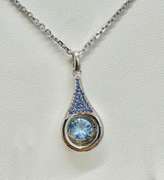 Platinum over 925 non tarnish Sterling silver with large fancy blue pendant
