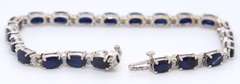 Attractive White Gold oval Blue Sapphire and Diamond Tennis Bracelet