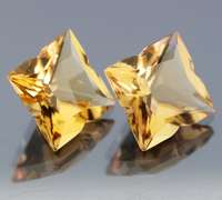 Gem grade! 14.48ct modified princess cut amber Quartz pair