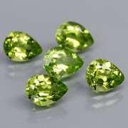 Dazzling 6.02ct untreated apple green Peridot set