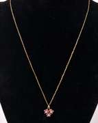 Sensational Ruby and Diamond Flower Pendant in 14K Yellow Gold