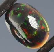 Glistening 1.63ct fiery flashing Welo Black Opal