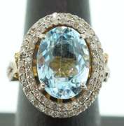 Gentle Blue Topaz Ring with Gold Plated Silver and Diamond Accents