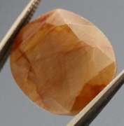 UNTREATED! Shimmering 11.46ct red toned faceted Sapphire