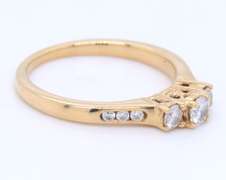 Charming Yellow Gold 3 Stone Diamond Ring