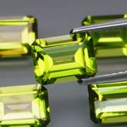 Emerald cut Unheated! 7.65ct Peridot set