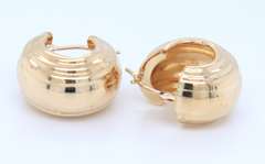 Pleasing Yellow Gold Ridded Huggies