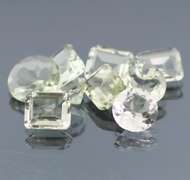 Gem grade 25.88ct multi-faceted green Quartz set