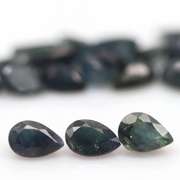 Heated only! 10.83ct blue green Sapphire set