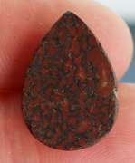 Really cool 7.67ct cabochon cut from dinosaur bone