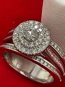 CERTIFIED LADIES PLATINUM AND DIAMOND RING