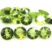 Fantastic 12.16ct 6mm round cut Peridot set