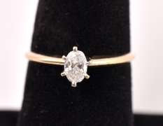 Elegant Solitaire Diamond Ring in 14K Yellow Gold