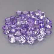 Heavy flashing 4.26ct diamond cut Tanzanite set