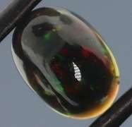 Glistening 1.63ct fiery flashing Welo Black Opal