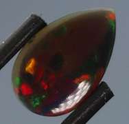 Glowing! 2.12ct full cover multi-pattern black Opal