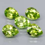Dazzling 6.18ct untreated apple green Peridot set