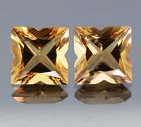 Gem grade! 14.48ct modified princess cut amber Quartz pair