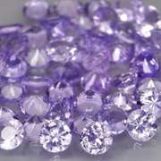 Heavy flashing 4.26ct diamond cut Tanzanite set