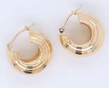 Pleasing Yellow Gold Ridded Huggies