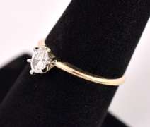Elegant Solitaire Diamond Ring in 14K Yellow Gold