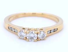 Charming Yellow Gold 3 Stone Diamond Ring