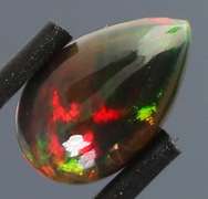 Glowing! 2.12ct full cover multi-pattern black Opal