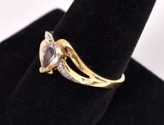 Lovely White Topaz Ring in Yellow Gold