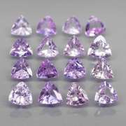 Glittering 3.57ct trillion cut Tanzanite set