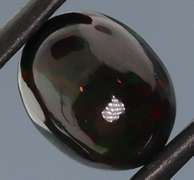 Tremendous 2.46ct red and green flashing Black Opal