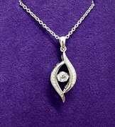 Platinum over 925 non Tarnish Sterling Silver with dancing simulated Stone