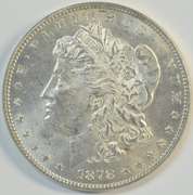 Creamy-white Choice BU 1878-P 7TF Morgan Silver Dollar.