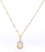 Delightful Yellow Gold Pearl and Round and Baguette Diamond pendant on Chain