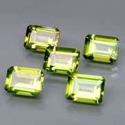 Emerald cut Unheated! 7.65ct Peridot set