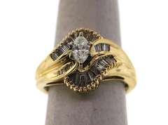 Amazing Oval Diamond Ring surrounded by Baguette Diamonds on a 14k Gold Band