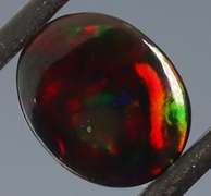 Tremendous 2.46ct red and green flashing Black Opal