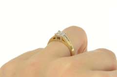 14K Yellow Gold 0.25 Ctw Princess Invisible Set Engagement Ring