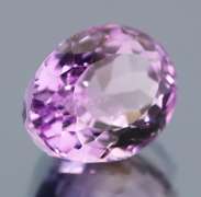 Glittering oval cut 7.36ct violet pink Amethyst