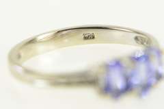 14K White Gold Oval Tanzanite Three Stone Diamond Accent Ring