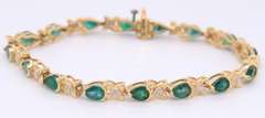 Attractive Yellow Gold Emerald and Diamond Tennis Bracelet