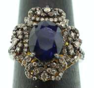 Impeccable Sapphire Ring with Intricate Diamond Studs on top Gold Plated Silver