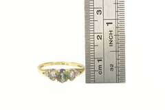 10K Yellow Gold Three Stone Oval Mystic Topaz CZ Accent Ring