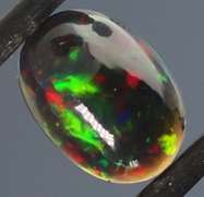 Glistening 1.63ct fiery flashing Welo Black Opal